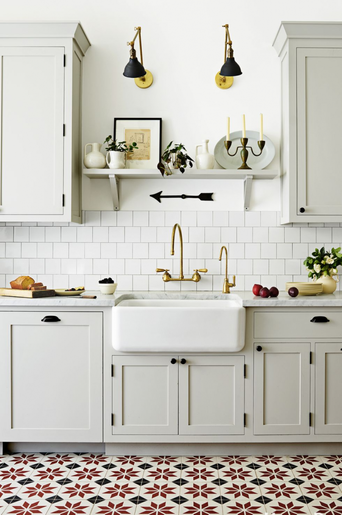 Stylish Small Kitchens, install a shelf above the sink, between cabinets, for extra space.