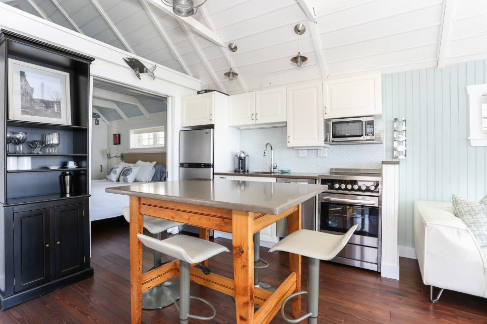 Stylish Small Kitchens, use a book shelf to storage space