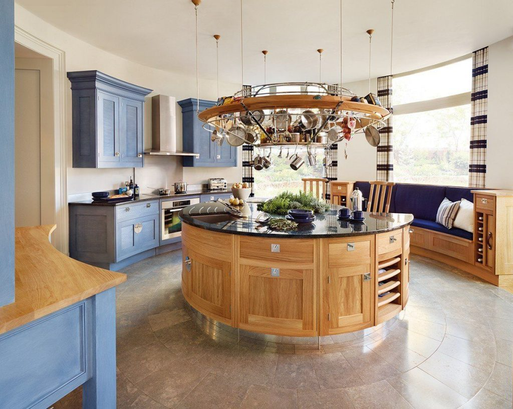 round kitchen island with wood cabinets