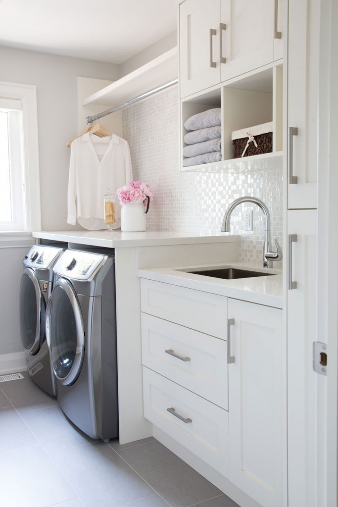 laundry room makeover idea, simply replace your laundry room cabinet doors. 

Image source: Contemoporist https://www.contemporist.com/7-ideas-for-making-your-laundry-room-more-organized/