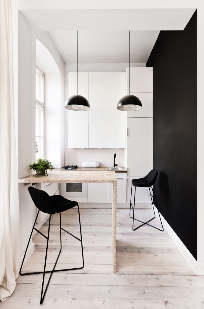 Stylish Small Kitchens, use furniture that can do double duty like this kitchen table that becomes an island.