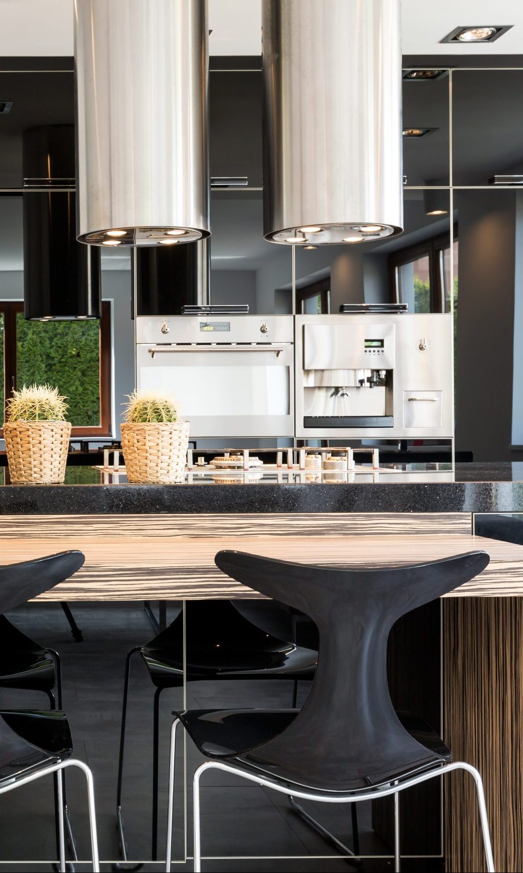 industrial kitchen with modern island and lights