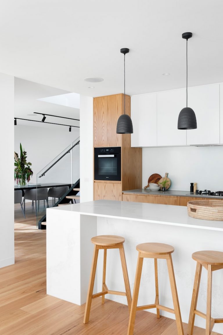 scandinavian style open concept kitchen with white cabinets, representing ikea cabinets