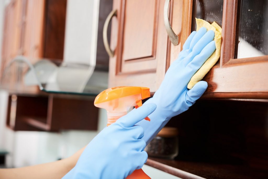 cleaning kitchen cabinets