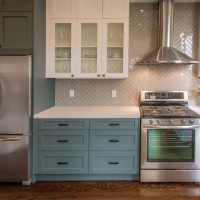 Modern Kitchen with Teal Base Cabinets