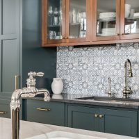 Transitional Kitchen with Stainless Steel Faucet. Glass front du