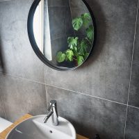 white ceramic sink with stainless steel faucet