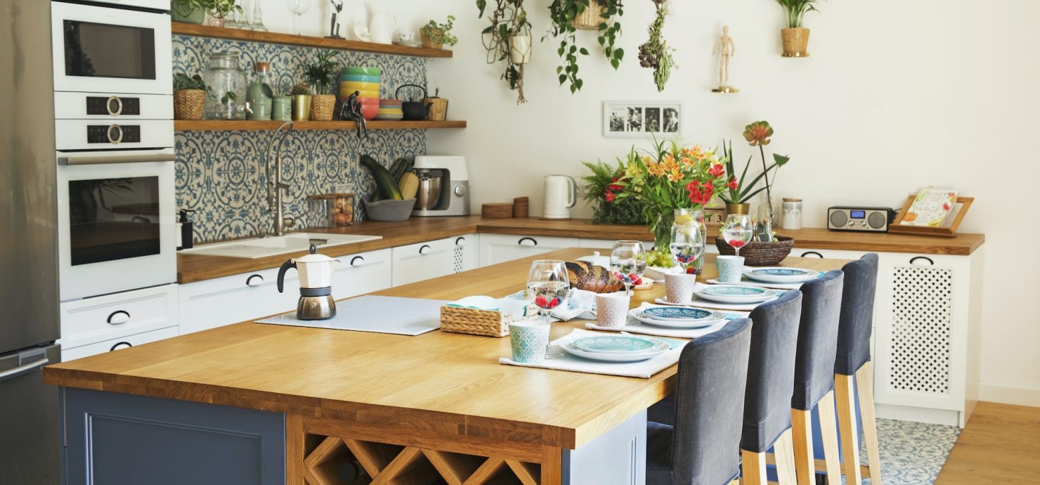 Stylish design of kitchen space interior with kitchen island.