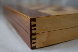 The interlocking joint of dovetail drawers looks like a jigsaw puzzle