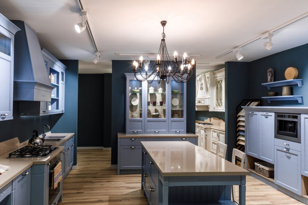 Interior of monochromatic modern kitchen in blue tones