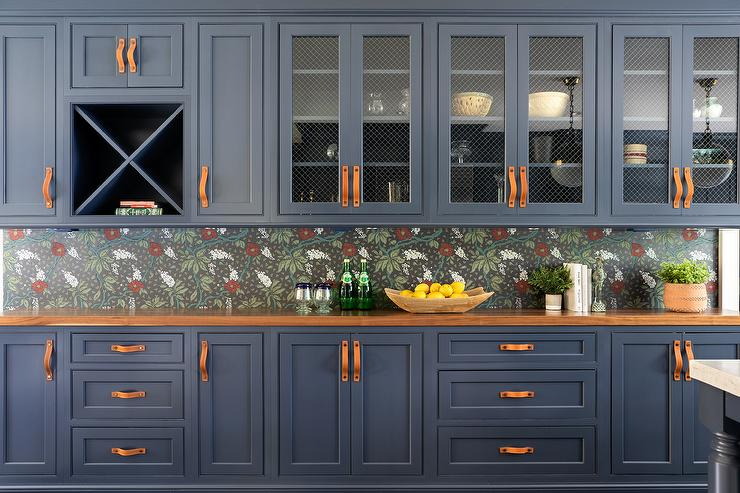 Blue cabinets with mesh installed. Source: Raychel Wade Interiors