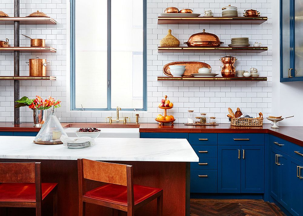 modern kitchen with gold metallic accents
Source: decoist.com