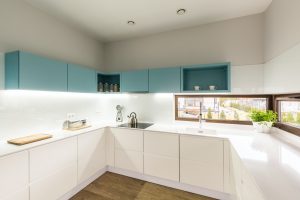 Modern white and turquoise kitchen